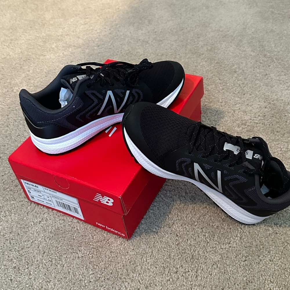 Youth new balance shows.  Never worn.